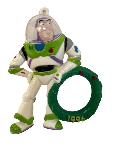 Vintage 1996 Toy Figurine of a Man in Space Suit - Collectible Cartoon Character