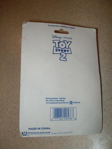 1995 Toy Story 2 Keychain Buzz Lightyear Monogram Flashlight  New in Package